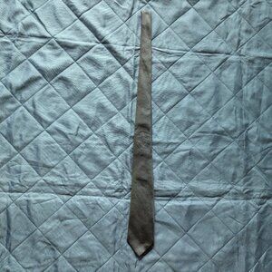 Alain Figaret black dot tie